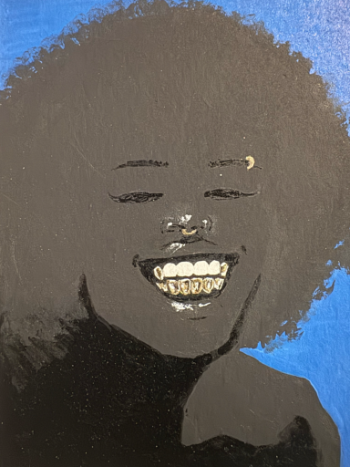 Smiling person with curly hair against a blue background, showcasing white teeth.